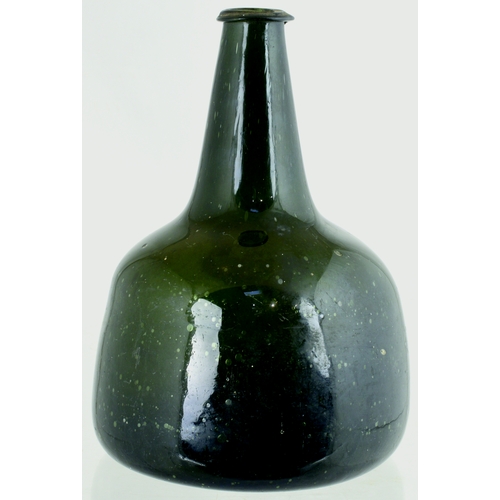 729 - SEALED MALLET WINE BOTTLE. 8ins tall. Very dark green glass, full of tiny seed bubbles, long taperin... 