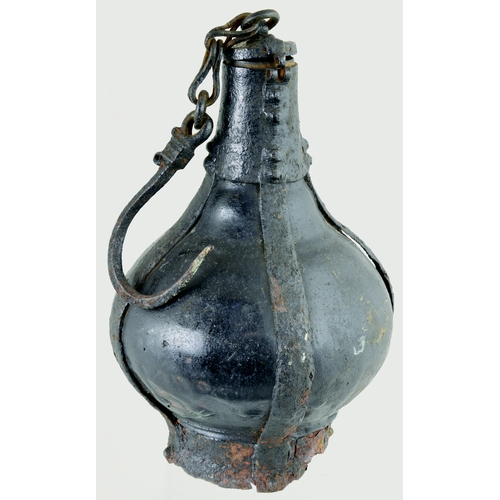 730 - GUNPOWDER FLASK? 8.5ins tall. Dredged from the River Thames many years ago this black glazed, potter... 