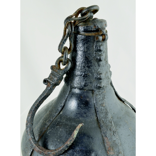 730 - GUNPOWDER FLASK? 8.5ins tall. Dredged from the River Thames many years ago this black glazed, potter... 