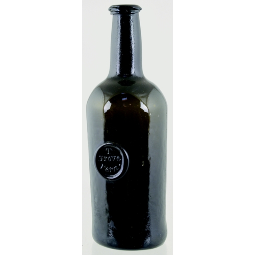 732 - SEALED CYLINDER WINE BOTTLE. 10.5ins tall. Very dark olive green glass, applied string rim lip, fron... 