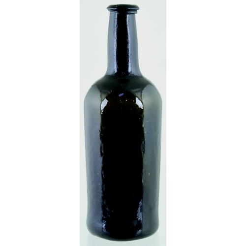 732 - SEALED CYLINDER WINE BOTTLE. 10.5ins tall. Very dark olive green glass, applied string rim lip, fron... 