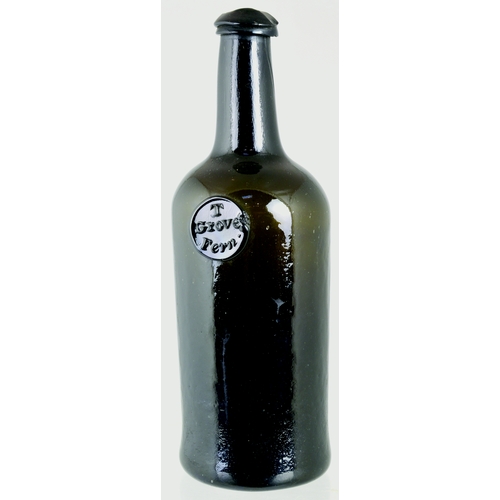 733 - SEALED CYLINDER WINE BOTTLE. 10.5ins tall. As previous lot, this having a more crude/ large double c... 