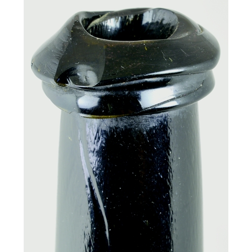 733 - SEALED CYLINDER WINE BOTTLE. 10.5ins tall. As previous lot, this having a more crude/ large double c... 