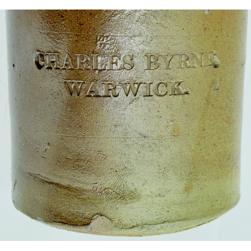 710 - WARWICK PORTER. 8ins tall. Variating tan salt glaze, front impressed CHARLES BYRNE/ WARWICK. DENBY A... 