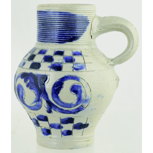 699 - WESTERWALD SALT GLAZED DRINKING JUG. 6ins tall. C.1715-1760, grey glaze, ribbed neck, dark blue body... 