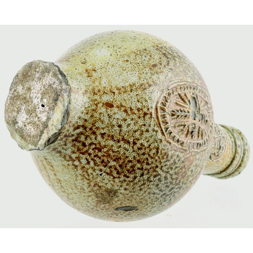 700 - BELLARMINE. 8.5 ins tall. Bulbous bodied Bellarmine jug in grey/ brown tiger glaze, bearded face to ... 