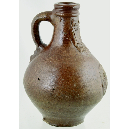 701 - BELLARMINE. 8.5ins tall. Bulbous bodied Bellarmine jug in brown tiger glaze, bearded face to neck, d... 