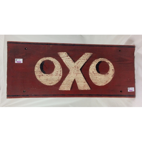 19 - WOODEN OXO SIGN. 24 x 10ins, red, white & black. Looks to have some age/ natural wear. Good.