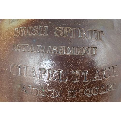 127 - IRISH SPIRIT FLAGON. 14.5ins, t, t, handled. Impressed IRISH SPIRIT/ ESTABLISHMENT/ CHAPEL PLACE/ CA... 