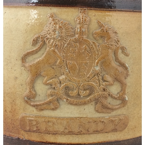 181 - SALT GLAZED BRANDY BARREL. 12.5ins, darker glazed rings around body. Large sprigged coat of arms to ... 