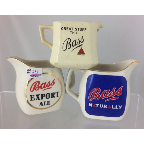 281 - BASS PUB JUG TRIO. Tallest 4.5ins. Three variations of square shape Bass jugs, 2 Wade, 1 Mintons p.m... 