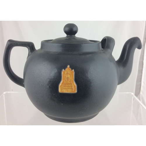 387 - GIANT DENBY WARE TEAPOT. 6.5ins. Black matt, orange star motif to centre, THE BURMA STAR/ BURMA STAR... 