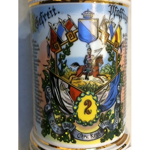 10 - IMPERIAL GERMAN MILITARY STEIN. 13ins, multicoloured, very decorative, handled. Pewter hinged lid wi... 