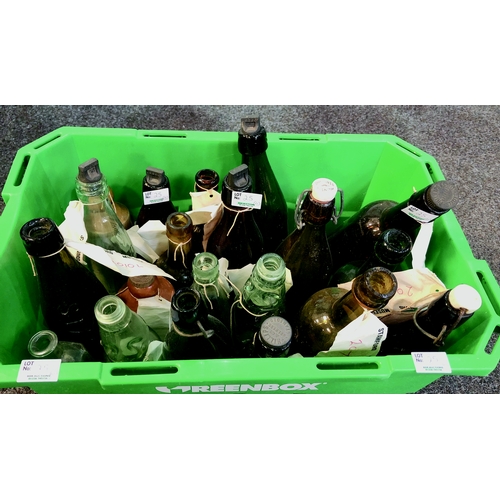 25 - MIXED BOTTLES GROUP. Inc. beers, codds, ginger beers etc. A very varied mix! Complete with green pla... 