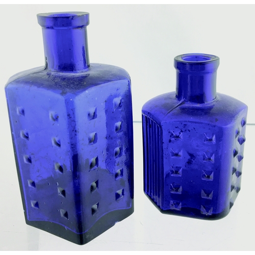 40 - HOBNAIL POISON DUO. Tallest 4.75ins. Cobalt blue glass, raised dots & ribs 2 sides, plain rear area.... 