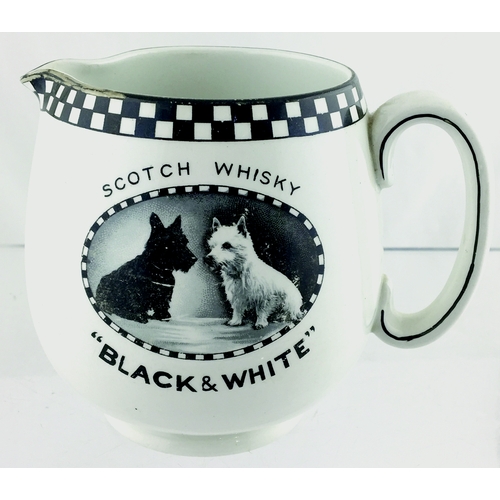 5 - BLACK & WHITE SCOTCH WHISKY WATER JUG. 4.25ins tall. White glaze, black transfer of black & white Sc... 