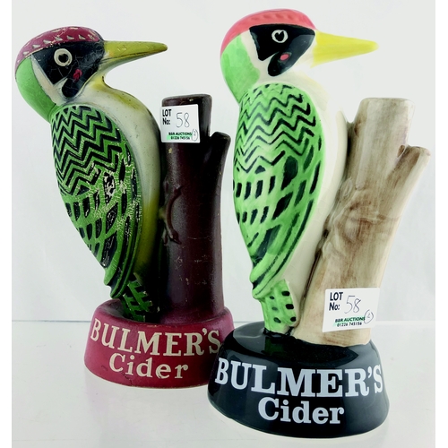 58 - BULMERS CIDER DUO. 8ins tall. Two variations of multicoloured woodpecker figures, one ceramic (Carlt... 