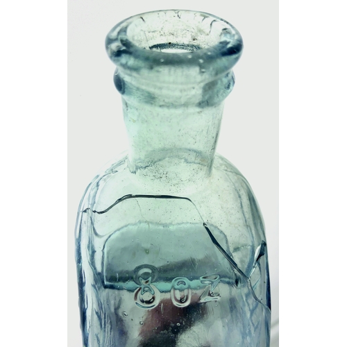 67 - MARTIN POISON BOTTLE. 7ins long. Ice blue glass, 8oz size, embossed THE MARTIN/ POISON BOTTLE one si... 