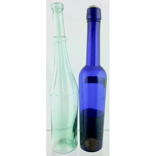 145 - CASTOR OIL DUO? 9.5ins tall. One aqua glass, long slender, slightly crude, facetted neck. Other Cros... 