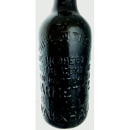 162 - GLASS DUO. Tallest 8ins, black glass embossed ginger beer with stopper BARRETT & CO LTD/ LONDON with... 