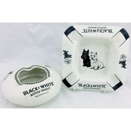 218 - BLACK & WHITE WHISKY ASHTRAYS DUO. Two variations, one square, one circular form. Both have pict. im... 