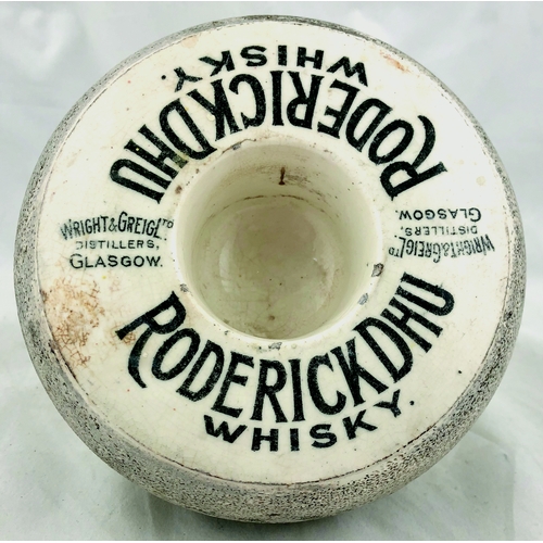 396 - RODERICK DHU WHISKY MATCHSTRIKER. 4.75ind diam, cream glaze top with black lettering, rough circular... 