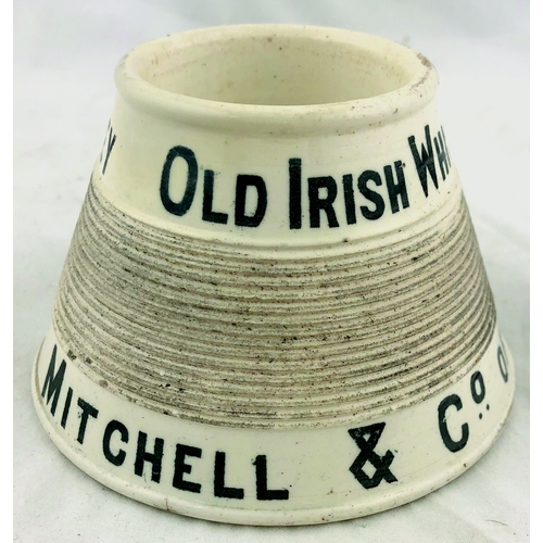 398 - MITCHELL & CO OF BELFAST LIMITED MATCHSTRIKER. 2.5ins tall, cream glaze, black lettering, circular s... 