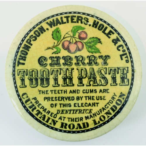 517 - LONDON CHERRY TOOTH PASTE POT LID. (APL p 401, 37) 2.75ins diam. Yellow background with coloured che... 