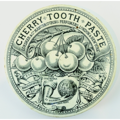 525 - LONDON CHERRY TOOTH PASTE POT LID. (APL p 341, 47) 3.25ins diam. Central transfer of buch of cherrie... 