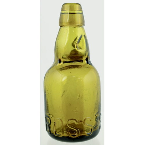 546 - WESTON SUPER MARE DUMPY CODD BOTTLE. 7.5ins tall. Amber glass dumpy codd, 2 neck retainng lugs, fron... 