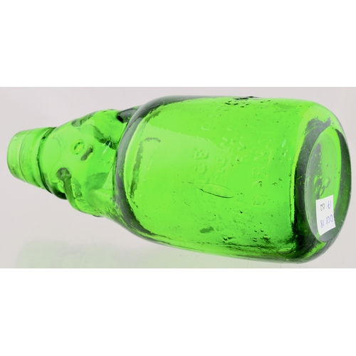 547 - RELIANCE PATENT CODD BOTTLE. 7.5ins tall. Bright green glass, 2 neck retaining lugs TRADE MARK below... 