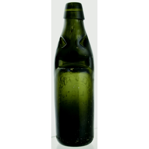 555 - OXFORD POWELL & BRISTOL CODD BOTTLE. 9ins tall. Very dark green glass, heavily embossed MORRELL’S TR... 