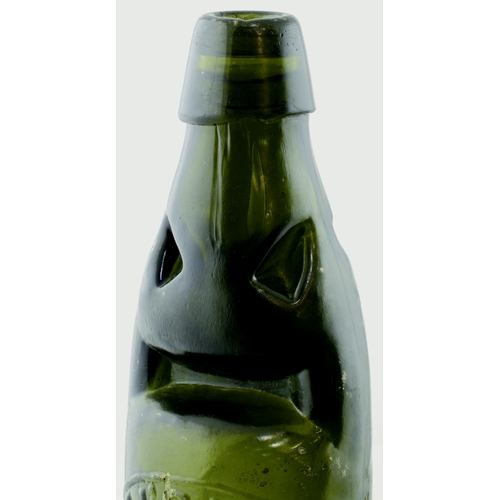 555 - OXFORD POWELL & BRISTOL CODD BOTTLE. 9ins tall. Very dark green glass, heavily embossed MORRELL’S TR... 