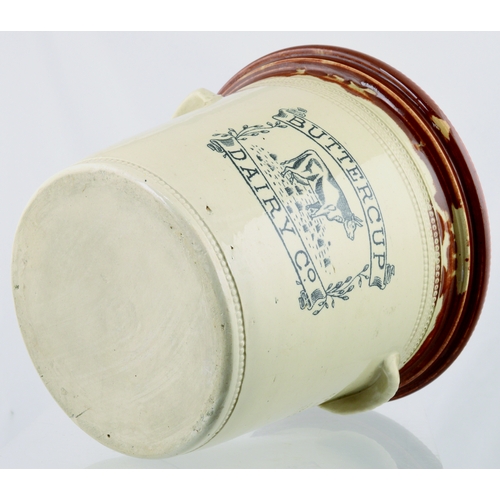 583 - BUTTERCUP DAIRY BUTTER-CROCK. 7.25ins tall. Brown rim, lower cream glaze, black transfer BUTTERCUP/ ... 