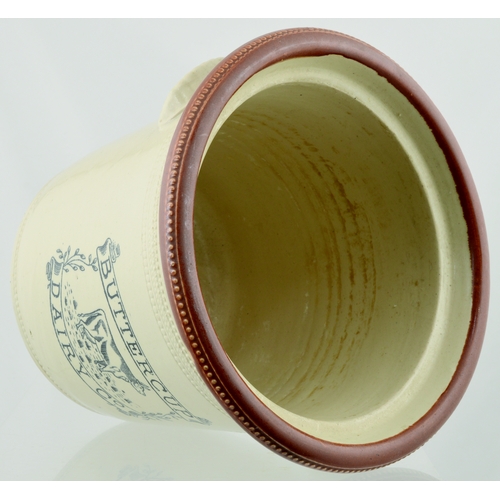 583 - BUTTERCUP DAIRY BUTTER-CROCK. 7.25ins tall. Brown rim, lower cream glaze, black transfer BUTTERCUP/ ... 