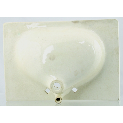 587 - MINIATURE TRADESMANS SINK SAMPLE. 9.25 by 6.5ins. Miniature tradesman sample sink, off white/ cream ... 