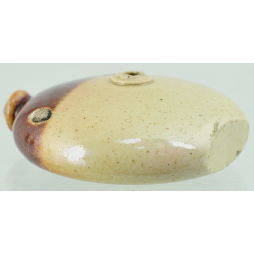 604 - FOOTWARMER - DOULTON?. 1.5ins tall. Tan top, variating brown glaze, fill hole to centre one side. Ve... 