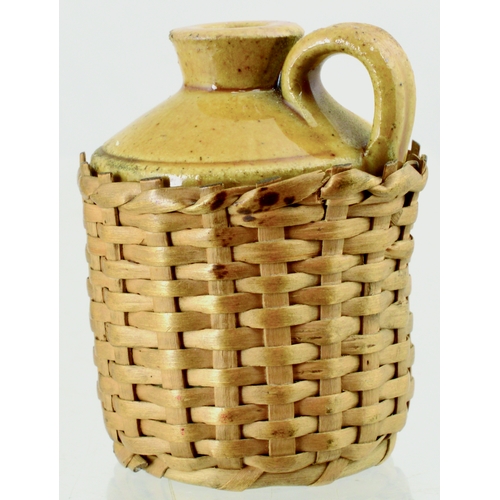 609 - LONDON FLAGON. 2.25ins tall. T.t, rear handle within labelled wicker basket for F.S. CLEAVER/ MAKER/... 