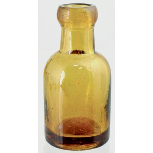 613 - SELTZER BOTTLE. 3.5ins tall. Rounded shoulders, blob lip, amber glass seltzer. Slight surface wear o... 