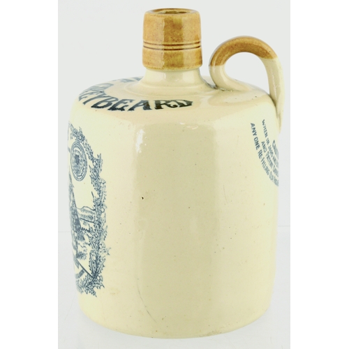 621 - THE GREYBEARD WHISKY JUG. (WG p 133) 6.5ins tall. Off white glaze, tan lip & rear handle, strong bla... 