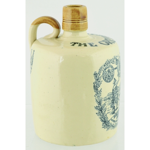 621 - THE GREYBEARD WHISKY JUG. (WG p 133) 6.5ins tall. Off white glaze, tan lip & rear handle, strong bla... 