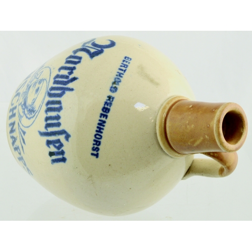 622 - BERTHOLD REBENHORST WHISKY JUG. (WG p 23) 7.25ins tall. Off white glaze, tan neck & rear handle. Blu... 