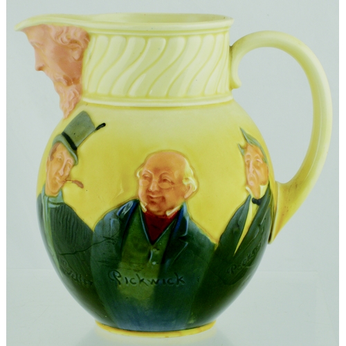 623 - DICKENS QUEENSWARE JUG. (JL p 43) 7.25ins tall. Handled Queensware jug showing the faces of Dickens ... 