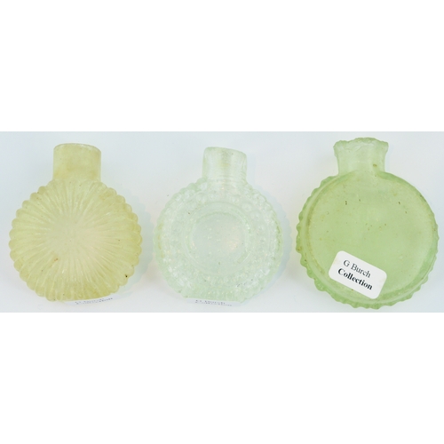 653 - PENNY PERFUMES TRIO. Tallest 2ins. All circular form, two clear, one aqua glass with various designs... 