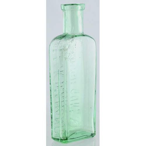 662 - BLACK DIAMOND COUGH CURE BOTTLE. 5.5ins tall. Aqua glass, rectangular shape cure, chamfered corners,... 