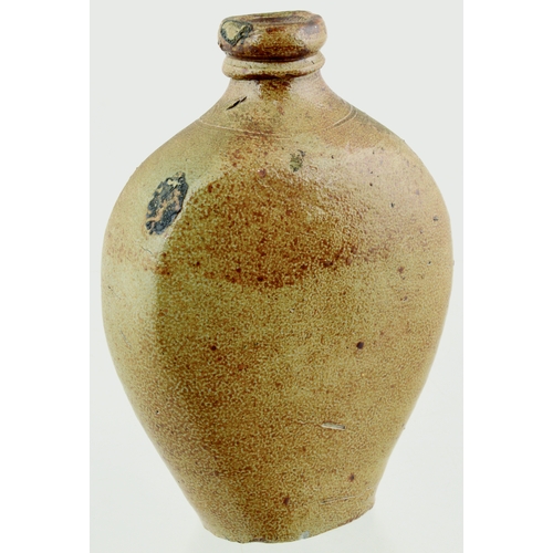 680 - LONDON SPIRIT FLASK. 6.25ins tall. Flattened ovoid shape flask, variating tan salt glaze, impressed ... 