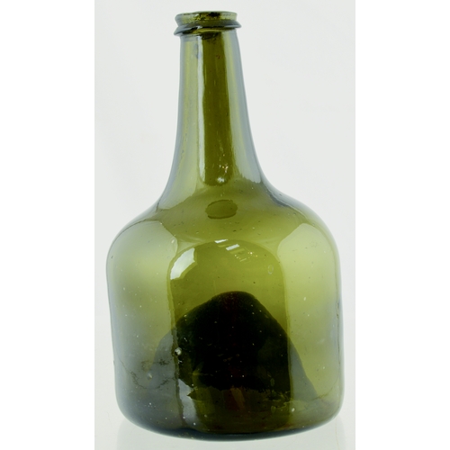 701 - SPLIT SIZE MALLET WINE BOTTLE. 6.5ins tall. Olive green glass, tapering neck, applied lip, kick up b... 