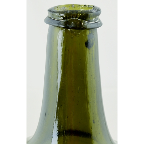 701 - SPLIT SIZE MALLET WINE BOTTLE. 6.5ins tall. Olive green glass, tapering neck, applied lip, kick up b... 