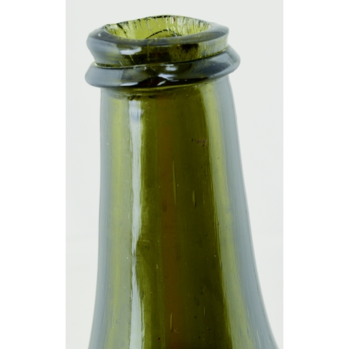 701 - SPLIT SIZE MALLET WINE BOTTLE. 6.5ins tall. Olive green glass, tapering neck, applied lip, kick up b... 