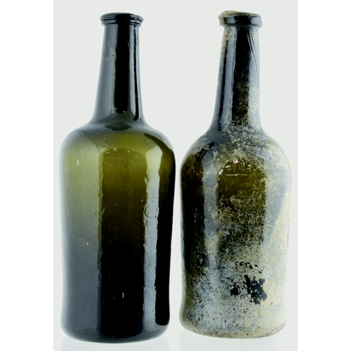 131 - PAIR OF CYLINDER WINE BOTTLES. 10.5ins tall. Dark green glass c. 1770-80, one having single string r... 